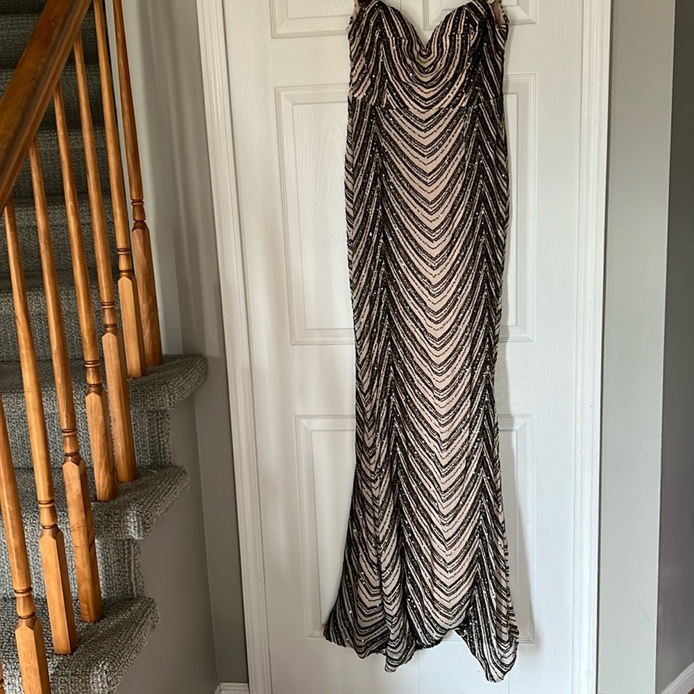 Long gown, black and white with sequence worn to a wedding off the shoulders